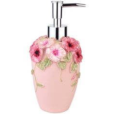 a pink soap dispenser with flowers on it