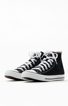 Rock a classic pair of skate kicks on your deck with the Chuck Taylor Black & White High Top Shoes. These go-to sneakers by Converse have a sturdy canvas upper, a high-top profile for ankle support, and a tongue gusset for a comfortable, stay-put fit.

PLEASE NOTE: This shoe is offered in men's sizes; the conversion for Converse shoes is two sizes smaller for women. For example, a woman who is a size 7.5 should order a size 5.5 in men's.


	Solid canvas upper
	Converse logos on side and hee Converse Hightop, Converse Chuck Taylor Black, White High Top Shoes, Chuck Taylor Black, Converse Logo, White High Tops, Black Converse, White Converse, Ankle Support