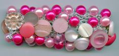 several different types of pink and white beads