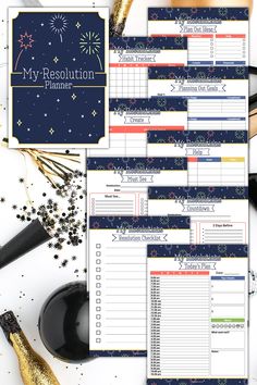 the new year's resolution planner is shown with gold confetti and fireworks