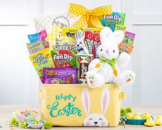 an easter basket filled with candy and stuffed animals