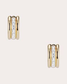 A fusion of past and present, the Sloane huggie earrings feature a triple-row design crafted from solid 14-karat gold. A central line of baguette-cut diamonds creates striking shimmer. Hinge closure 14k yellow gold and recycled diamond Diamond carat: 0.45 ctw Polish with soft cloth Handmade in the USA Measurements Width: 6mm Huggie diameter: 13.6mm Central Line, Gold Diamond Hoop Earrings, Baguette Cut Diamond, Diamond Carat, Diamond Hoop Earrings, Past And Present, Huggie Earrings, Women Diamond, Baguette Cut