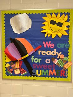 a bulletin board that says we are ready for a sweet summer day with an umbrella