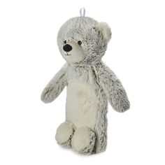 a gray teddy bear sitting on top of a white floor