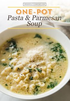 one pot pasta and parmesan soup in a white bowl