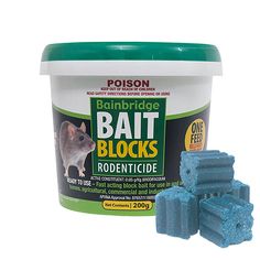 a tub of bat blocks next to two pieces of blue toothpaste on a white background