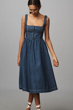 Denim, decoded: We’re digging denim in every corner of our closet. A different sort of Tagliatelle. Crafted from denim, the Tagliatelle Midi Dress by Reformation presents a fitted, corset-style bodice and full, swinging skirt. | Tagliatelle Denim Midi Dress by Reformation in Blue, Women's, Size: 12, Cotton at Anthropologie Dresses Size 12 Women, Denim Dress Fall Midi, Wedges And Midi Dress, Long Denim Dress Summer, Denim Dress Bridesmaids, Blue Denim Dress Fall, Everyday Dresses Casual Midi, Casual Blue Midi Dress, Formal Denim Dress