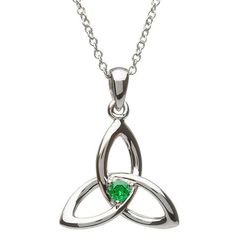 This sterling silver Celtic knot stone pendant is the elegant addition to any Celtic lover’s jewelry box. The glistening silver spilling over the round edges of the classical Celtic knot design sets the stage for the astonishing green of the centered emerald. Small simple yet elegant this stone pendant is the definition of class. Made with Love Each necklace ring bracelet and pendant from Shanore is made with extreme dedication and care. The artisan quality of this piece will abound far and long Claddagh Engagement Ring, Celtic Trinity Knot, Celtic Wedding Rings, Jewelry Design Inspiration, Celtic Wedding, Trinity Knot, Jewelry Tags, Emerald Pendant, Popular Jewelry