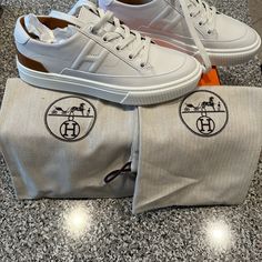 Deep Low-Top Sneakers In Calfskin From Hermes Casual Style H Logo Made In Italy Luxury White Sneakers With Removable Insole, White Calf Leather Sneakers With Removable Insole, Hermes Sneakers, H Logo, H Logos, Hermes Shoes, Amelie, Moccasins, Low Top