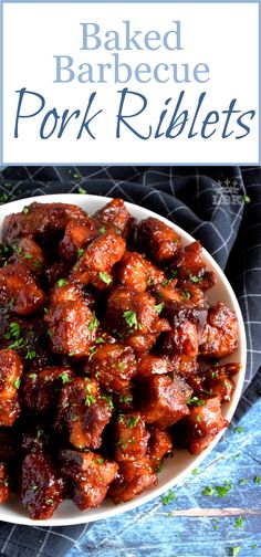 baked barbecue pork rillets in a white bowl on top of a blue cloth