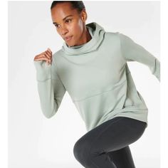 Sweaty Betty Galvanise Running Hoodie This Lightweight Hooded Pullover Brings An Extra Layer Of Warmth To Chilly Morning Runs With A Funnel Neck, Roomy Hood And Curved High-Low Hem. 25" Front Length; 28 1/2" Back Length (Size M) 90% Polyester, 10% Wool Machine Wash, Dry Flat Casual Workout Tops With Funnel Neck, Winter Workout Tops With Funnel Neck, Funnel Neck Tops For Winter Workout, Funnel Neck Workout Tops For Winter, Fall Sportswear Funnel Neck Tops, Winter Workout Green Hoodie, Funnel Neck Top For Fall Workout, Funnel Neck Workout Top For Fall, Green Workout Tops For Winter