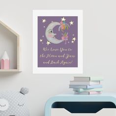 a child's room with a purple background and stars on the wall above it is a framed print that says we love you to the moon and stars and back again