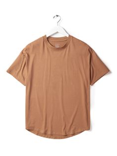 Experience ultimate softness with our Oversized Bamboo Tee. Made from sustainable bamboo fabric, this tee is breathable, hypoallergenic, and perfect for sensitive skin. Available in both kids and adult sizes, in Night Fall and Caramel, it’s a versatile piece for any fall outfit. Material + Wash 92% Bamboo | 8% Spandex Machine Wash Cold Non Chlorine Bleach When Needed Tumble Dry Low Warm Iron if Necessary Do Not Dry Clean Size + Fit: True to Size Oversized Fit Oversized Brown T-shirt For Everyday, Everyday Soft-washed Brown Tops, Everyday Soft-washed Brown Top, Brown Relaxed Fit T-shirt For Summer, Comfortable Brown Tops For Everyday, Comfortable Brown Cotton Tops, Casual Brown Organic Cotton Tops, Basic Solid T-shirt For Loungewear, Comfortable Soft-washed T-shirt