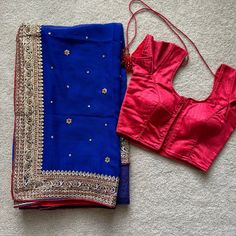 Beautiful Royal Blue With Red And Golden Accent. Comes As A 2-Piece Outfit (Saree And Blouse) Brand New, Never Worn! No Tags. Originally From India, Made Of High Quality Fabric And Stitching. Style: Saree Sari: - Sizing: One-Size Fits All Blouse: - Rib Cage: 12" - Blouse Length: 13" - Sleeve Length: 4.5" - Sleeve Opening: 5" - Extra Margin: ~1.5 Inches On Both Sides - Fish And Eye Hooks In The Front For Easy Closure - High Quality Padding/Cups - Strings In The Back For A More Fitted Look Sarees Saree Blue, Blue Silk Saree, Mysore Silk Saree, Traditional Silk Saree, Hot Pink Floral, Eggplant Color, Ready To Wear Saree, Ethnic Sarees, Silk Saree Blouse