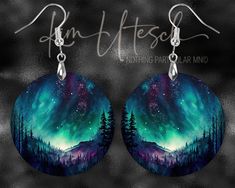 Northern Lights, Forest and Mountains Night Sky, Style Two. Custom Designed, Handmade Earrings. Round or teardrop shape. Printed front and back, black edges. Multiple sizes are available. Hypo-allergenic hardware, light weight. rubber backs.  $15.00 each pair. Custom made when ordered. Finished products are amazing, shiny, and vibrant! All items are very light-weight and sturdy. Earrings and pendants are made of High-Quality Wood material, with a bright surface, and sooth finish. Printing is done through a sublimation process and offers high gloss, long lasting, durable wear. Please, note the earring hook style may vary from photos. Please, allow for slight variations in color and measurements. A perfect gift for any occasion or as a special treat for yourself. Northern Lights Ornament Diy, Northern Lights Jewelry, Northern Lights Earrings, Aurora Borealis Beaded Earrings, Mountains Night, Northern Lights Tumbler, Light Jewelry, Xmas 2024, Hand Painted Earrings