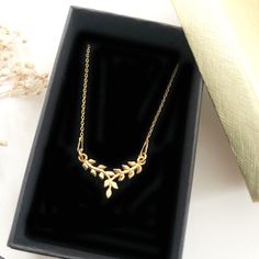 "Gold Branch Necklace | Delicate Branch Pendant | Minimalist leaf Necklace | Nature Necklace | cute pendant | dainty jewelry | gift for women ♡ DESCRIPTION Delicate elegant necklace with leaf pendant, made of sterling gold plated 24 k over sterling silver 925. ♡ DETAILS Charm :0.78\"- 20 mm Chain length : approx. shorter 16.53\" or longer 18.11\" ( 42 or 46 cm) Material:gold plated 24 k 925 Sterling Silver The jewelry is made entirely of 925 sterling silver or 24K gold plated elements. Gold plat Elegant Leaf-shaped Everyday Jewelry, Elegant Everyday Leaf-shaped Jewelry, Leaf-shaped Jewelry For Gift, Gold Branches, Pendant Minimalist, Branch Necklace, Necklace Cute, Nature Necklace, Discount Jewelry