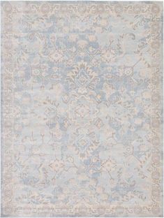 a blue and beige rug with an ornate design