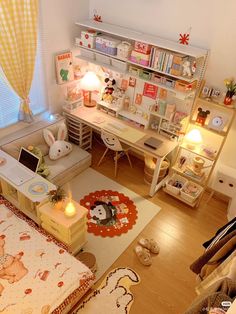 an aerial view of a child's bedroom with toys