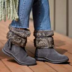 Shake up your style with a boot for snowy treks. Featuring layers of cascading faux fur accented by a braided suede tie, you'll demand attention at every turn. This water repellent winter boot is ideal through the wintery months for a playful edge that goes with any outfit. Moccasins Boots, Minnetonka Moccasins, Boots Slippers, Style For Men, Moccasins Shoes, Kids Slippers, Round Toe Heels, Slipper Sandals, Cool Boots