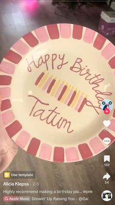 a pink and white plate with the words happy birthday written on it