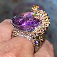 Absolutely Breathtaking And Specially Designed Ring With Genuine Pear Cut 32 Ct Amethyst, Accented With Colorful Genuine Sapphire, Chrome Diopside And Tanzanite! All Stones Are Precious, Beautifully Cut And Carefully Selected Just For This Ring. 925 Sterling Silver, Rhodium And 13 K Yellow Gold Overlay. Endless Magic! An Ethereal Stunner! Purple Diamond Ring, Peacock Ring, Purple Ring, Gold Overlay, 925 Jewelry, Pear Cut, Bling Bling, Womens Jewelry Rings, Pear