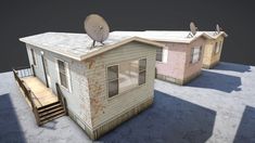 three tiny houses with satellite dishes on top