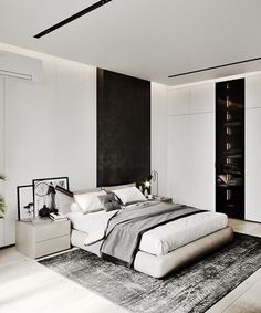 a modern bedroom with black and white decor, including a large bed in the center