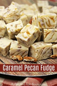 caramel pecan fudge on a plate with nuts