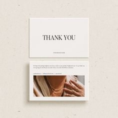 a white business card with the words thank you on it and an image of a woman's hand