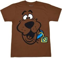 a brown t - shirt with a cartoon dog on it