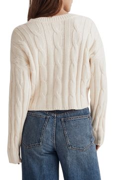 A classic cable-knit style in a supersoft cotton blend. With a cropped, slim fit, this V-neck sweater is a match made in heaven with high-waist everything. 18 1/2" length (size Medium) V-neck Long sleeves 53% cotton, 35% acrylic, 12% polyester Machine wash, tumble dry Imported Winter Cable Knit V-neck Cropped Sweater, Trendy Fitted Cable Knit Cropped Sweater, Fitted Cozy Cable Knit Cropped Sweater, Cozy Fitted Cable Knit Cropped Sweater, Fitted Cable Knit Cropped Sweater, Cropped Cable Knit Sweater For Winter, Cozy Cropped V-neck Cable Knit Sweater, Winter Cropped Cable Knit Sweater, Cropped Cable Knit Winter Sweater