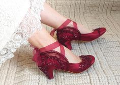 "Burgundy lace embellished wedding shoes for bride or matching bridesmaids shoes. Fall weddings or moody dark weddings; these jewel toned shoes add a beautiful sparkle on your dress... Low heel bridal shoes keep you comfortable all night long! Gothic wedding shoes, custom wedding gift, Valentine's gift for girlfriend. Bordeaux satin wedding heels are designed with embroidered floral lace appliques. Burgundy glass beads and shiny sequins are used on the embroidery, creating a nice contrast with your wedding dress. Organza ribbons can be tied on the front as a bow, or around your ankle ballerina style. They are made of soft smooth satin and delicate lace, each handmade item is unique and can differ in details only slightly. Custom details can be added on this design, soles can be personalize Gothic Bridal Shoes, Red Wedding Shoes Brides Heels, Red Rhinestone Wedding Heels, Elegant Embellished Heels For Ceremony, Elegant Embellished Heels For Wedding, Evening Lace Wedding Shoes, Elegant Embellished Shoes For Wedding Guests, Elegant Embellished Wedding Shoes For Guests, Elegant Embellished Wedding Guest Shoes