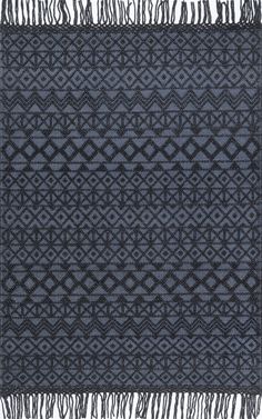 a black and grey rug with fringes on it