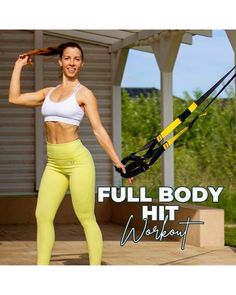 a woman in yellow tights and white top holding a pole with the words full body hit workout on it