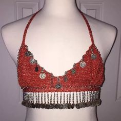 Nwot Bellydance Bollywood Metallic Shimmer Coin Halter Dance Bra Top New Without Tags! -For Bellydance Or Bollywood Costume Attire -Soft Tight Crochet Weave W/ Metallics Silver-Tone Metal Coin & Bead Decoration -Color: Burnt Orange Sienna -Lovely & Vibrant Color Against All Skin Tones -Size: Small Cup: A-B -Circumstance: Up To 47 Inches Can Be Tied Around Bust Area. -Never Worn - It Came In A Bag Without Tags. Really Cute & Matching All Color. Vibrant ! ~No Smoke No Pet Environment~ Traditional Fitted Festival Crop Top, Traditional Fitted Crop Top For Festivals, Bohemian Fitted Crop Top For Party, Fitted Bohemian Crop Top For Party, Fitted Red Choli For Festivals, Summer Party Fitted Choli, Summer Party Choli Fitted, Fitted Choli For Summer Parties, Fitted Choli For Party And Festival