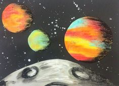 an image of three planets in the sky painted with chalk pastel on black paper