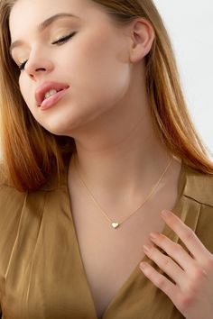 Tiny Gold Heart Necklace, 14k 18k Solid Gold Necklace Pendant, Minimalist Love Necklace Romantic Gift for Wife and Girlfriend, Heart Jewelry FEATURES * Solid Gold (real gold, not gold plated or gold filled material) * Gold Karat: 10K (417) - 14K (585) - 18K (750) (optional) * Pendant Height: * Pendant Width: * Available Gold Color: Yellow gold, rose gold and white gold (optional) * Necklace length: 14-16-18-20-22-24 inches Wholesale requests are welcome. Our gold necklaces are perfect choice for Dainty 14k Gold Heart Necklace With Adjustable Chain, Minimalist 14k Gold Necklace For Valentine's Day, Minimalist Yellow Gold Necklace For Valentine's Day, Minimalist White Heart Necklace For Wedding, Delicate 14k Gold Heart Necklace With Adjustable Chain, Minimalist Gold Plated Necklace For Valentine's Day, Minimalist 14k Rose Gold Heart Necklace, White Heart Cut Minimalist Necklace, Minimalist White Heart Cut Necklace