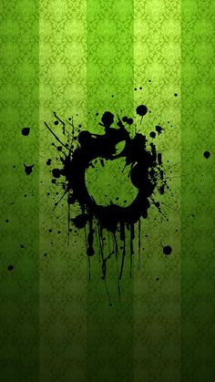 an abstract green background with black paint splattered on the bottom and bottom half