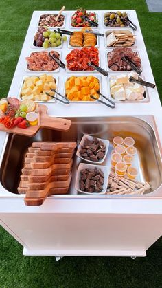 a buffet table filled with different types of food