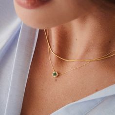 Green is a color that represents rebirth, good fortune, and youth. You can express your feelings or let the right vibe in with this green birthstone necklace. 14k solid gold handcrafted pieces 100% ethical sourced jewelry Material: 14k Solid Gold Diamond Quality:Carat Weight: 0.03 ctwColor: F-GClarity: VS2Cut: Excellent Emerald carat: 0.3 ctw Pendant Height: 6 mm / 0.23 inch Pendant Width: 6 mm / 0.23 inch Chain Style: Cable Chain Chain Length: 18 inch Sapphire Necklaces, Emerald Halo, Halo Necklace, Gold Shop, Gold Diamond Necklace, Emerald Necklace, Diamond Necklaces, Unique Diamonds, Sapphire Necklace