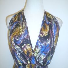 New With Tags Apsara 100% Silk Knit Dress Size 6 Halter Neck Ties In Back V Neck..Supers Sexy! Made In The Usa Swirl Abstract Pattern In Blues Purples Golds And Ivories The Colors Are Amazing! Measures Length 46 Bust 33(Open Back So Theres Some Room Here Waist 30 Stretchy Hips 38 Evening Multicolor Stretch Maxi Dress, Purple Stretch Maxi Dress For Night Out, Fitted Purple Halter Neck Maxi Dress, V-neck Club Dress With Back Zipper, Multicolor Halter Neck Tie-back Swimwear, Multicolor V-neck Loungewear Dress, Multicolor Stretch V-neck Dress, Silk Knit, Multicolor Abstract Print V-neck Maxi Dress