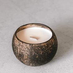 Coconut-Soy Candle by Coconut Bowls Coconut Shell Candle, Fruit Candles, Coconut Bowls, Coconut Candle, Eco Friendly Candles, Coconut Bowl, Coconut Lime, Wooden Wick, Tropical Fruits