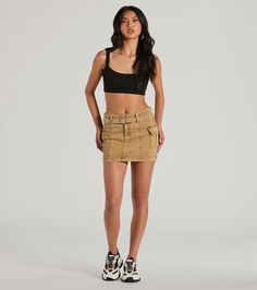 Stay on top of the trends in this cute and casual cargo mini skirt! It features a mid-rise waist, a belted design with double grommet detailing, cargo-style pockets on each side, a mini-length hem, and a form-fitting silhouette. The woven fabric offers a moderate stretch. Style this cargo mini skirt with a basic bodysuit, hoop earrings, and clear mules!Fit & FeaturesMid-rise waistBelted design, double grommet detailingDual front button closures, hidden zipper closureDual cargo pocketsMini-length hem, form-fitting silhouetteCotton-blend woven fabric, moderate stretchRuns true to size Graduation Dresses White, Clear Mules, Short Graduation Dresses, White Dresses Graduation, Dress Satin Bridesmaid, Backless Dress Short, Basic Bodysuit, Cargo Mini Skirt, Prom Dress Shoes