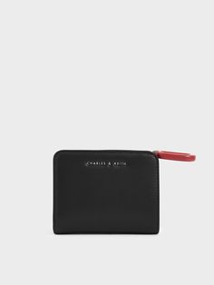 This season, your essentials in the palm of your hands with this small but functional wallet. Designed with a top zip for convenient access, this black beauty has everything you would want in a wallet and more. Toss it into your everyday bag or slip it into your back pocket for easy access. Mini Top, Keychain Wallet, Charles Keith, Palm Of Your Hand, Small Wallet, Everyday Bag, The Palm, Black Beauty, Your Back