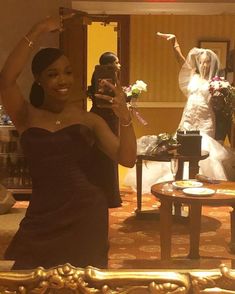 a woman taking a selfie in her wedding dress