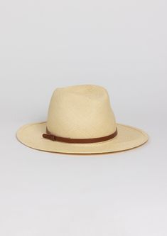 We love this Panama hat with a clean brim and SPF protection to shade you from the sunny rays. Our continental is hand made by local workers in our Stamford, CT factory. We are proud of our made in USA products. Material: 100% Panama Straw, 100% Leather Bands Measurements: Brim: 7.62cm, Head Measurement is 57cm Dry Cle Classic Hats With Upf 50+ And Curved Brim, Summer Fedora With Short Brim For Everyday, Panama Hat With Upf 50+ And Curved Brim, Everyday Summer Hats With Flat Crown, Everyday Summer Hat With Flat Crown, Summer Everyday Toquilla Straw Fedora, Summer Fedora In Toquilla Straw, Everyday Summer Fedora In Toquilla Straw, Upf 50+ Toquilla Straw Fedora With Curved Brim