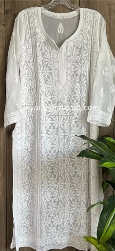 Beautiful white kurta with fine hand embroidery! Kurti Length:47 inches Liner included White Kurta With Chikankari Embroidery For Festivals, Traditional White Chikankari Long-sleeve Wear, White Traditional Wear With Chikankari Embroidery And Long Sleeves, White Cotton Traditional Wear With Cutwork, White Kurta With Motifs For Festive Occasions, White Long Sleeve Kurta With Chikankari Embroidery, White Straight Kurta With Motifs, White Straight Kurta With Intricate Embroidery, White Chikankari Embroidery Traditional Wear For Transitional Season