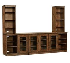 a wooden bookcase with glass doors on the front and back sides is shown in this image