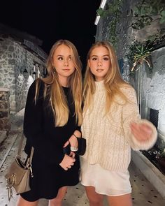 two young women standing next to each other