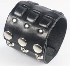 The triple weave at Leatherpunk is a one of a kind 2 3/8" wide leather wristband Punk Style Leather Cuff Bracelet With Wrist Strap, Adjustable Edgy Cuff Bracelet For Concert, Edgy Adjustable Cuff Bracelet For Concerts, Edgy Adjustable Cuff Bracelet For Concert, Punk Cuff Bracelets With Rivets, Punk Style Leather Cuff Bracelet, Black Band Wristband For Concerts, Adjustable Black Wristband With Rivets, Edgy Adjustable Cuff Leather Bracelet